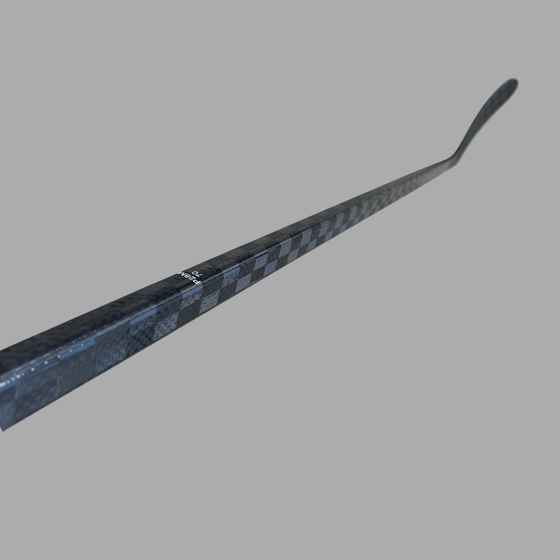 Close-up of the LabSports Pro All Black V1 carbon hockey stick shaft design