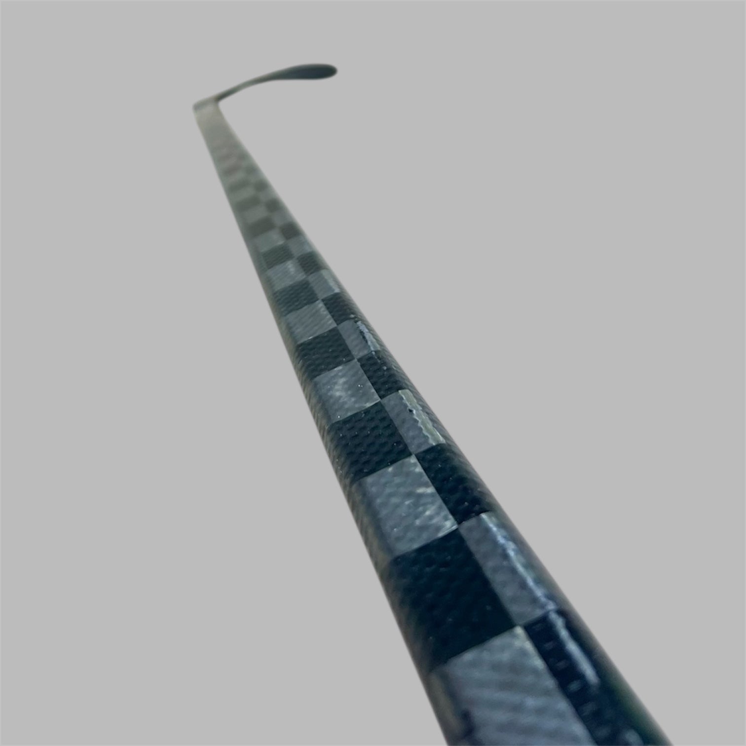 Bâton de hockey LabSports Pro All Black V1 en carbone 24K offrant légèreté, durabilité et performance.