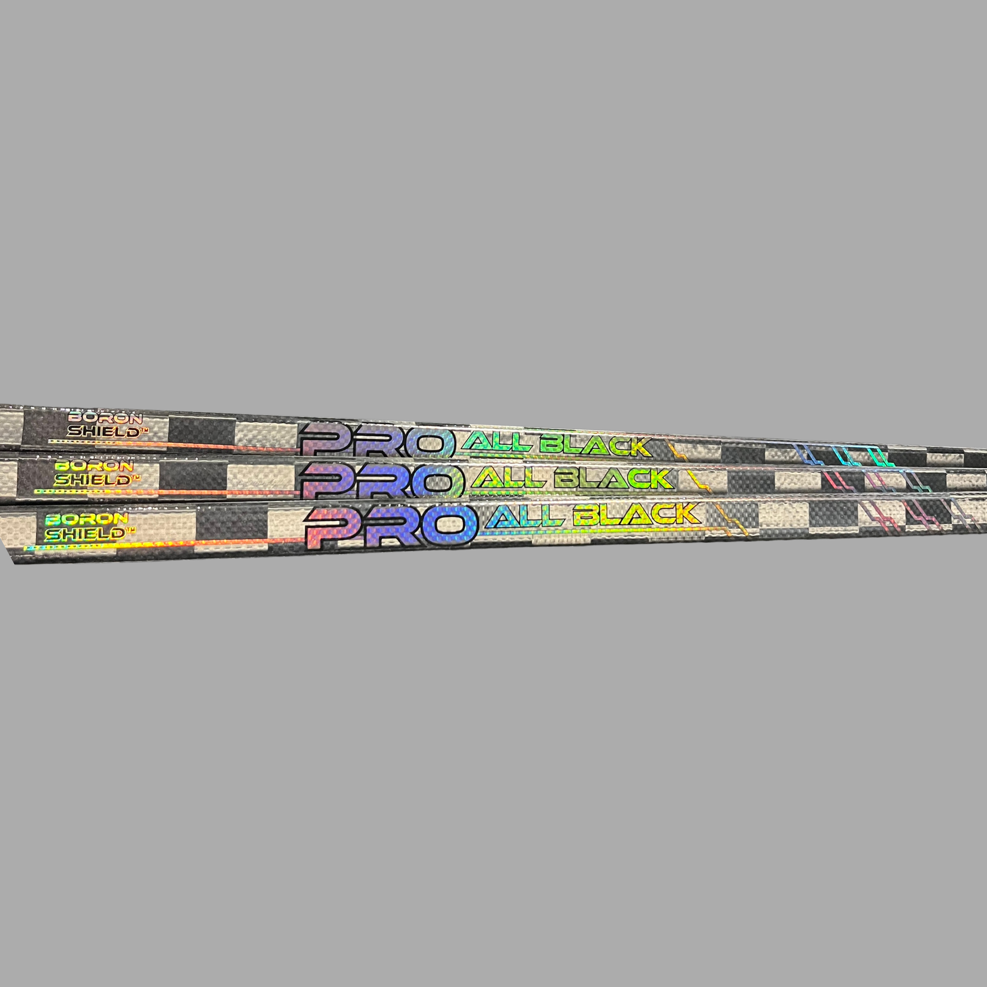 Détail du shaft du bâton de hockey Pro All Black V2 en carbone 24K