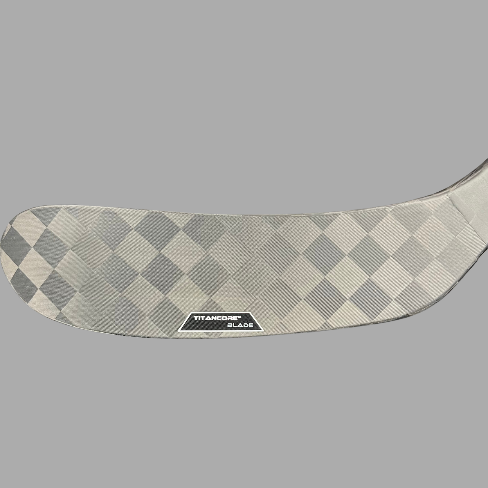 Palette TitanCore avec noyau renforcé au titanium pour un meilleur contrôle du puck