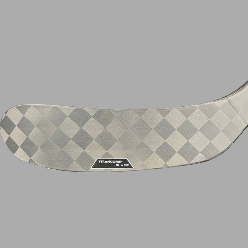 Palette TitanCore avec noyau renforcé au titanium pour un meilleur contrôle du puck